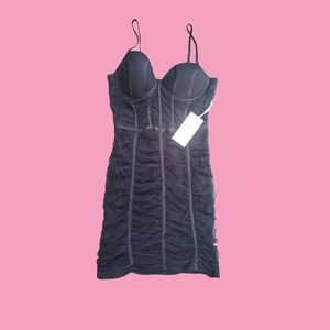 Blashē black ruffled mesh mini dress.